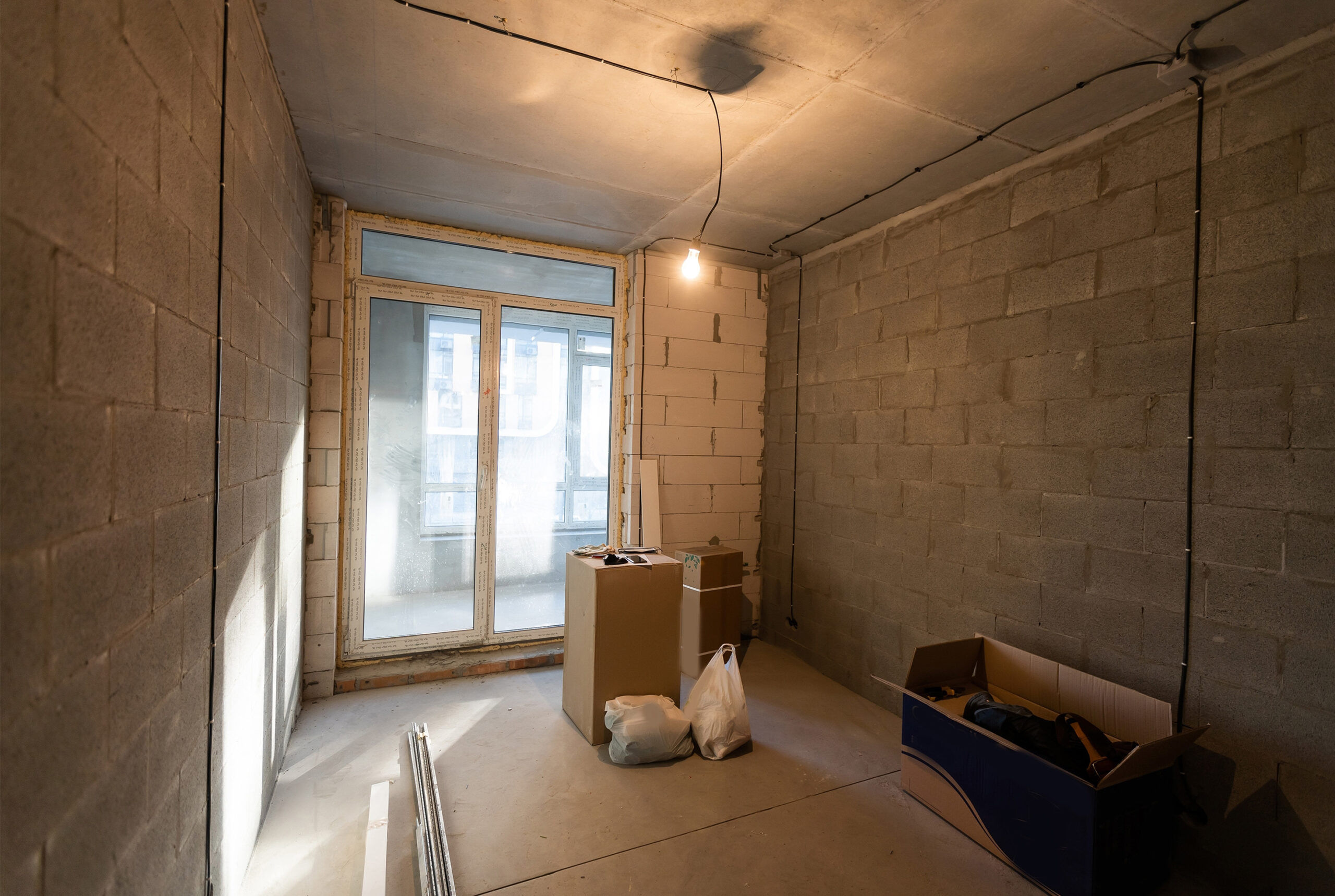 construction of the wooden frame of a roof Fibrerglass insulation installed in the sloping ceiling of a house. Construction of Drywall-Plasterboard Before and after